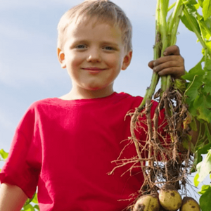 child at regenerative farm